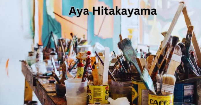 paint brushes and paint cans on a table aya hitakayama