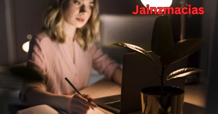 a person writing on a paper jainzmacias