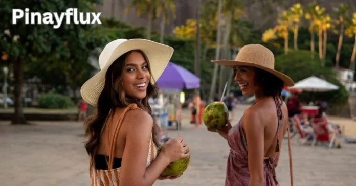 two women wearing hats and holding coconuts pinayflux